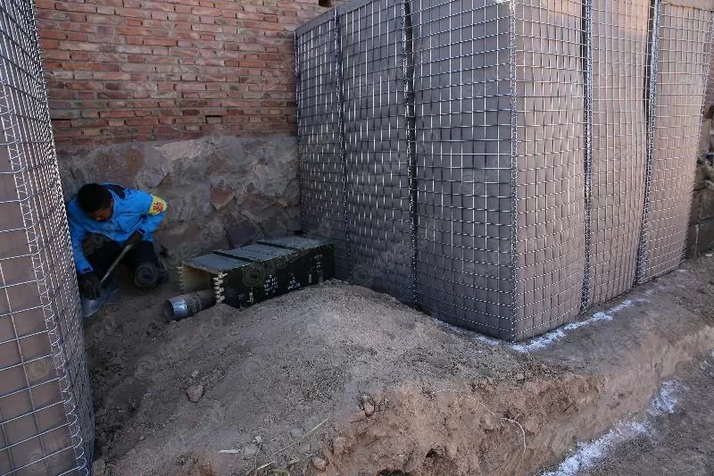 Crews are using the hesco barrier as a safety barrier for detonating warheads left over from WWII.